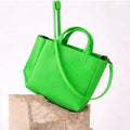 Ampersand As Apostrophe Leather Micro Tote in Neon Green $462