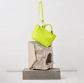 Ampersand As Apostrophe Leather Micro Tote in Neon Yellow $462