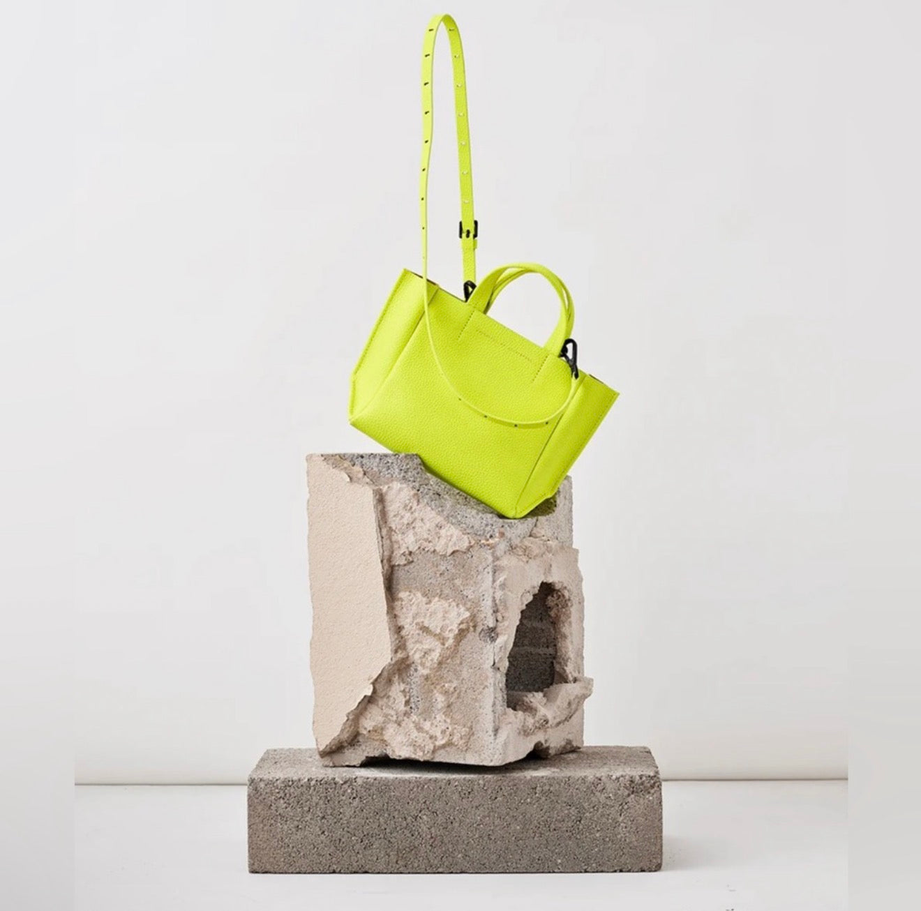 Ampersand As Apostrophe Leather Micro Tote in Neon Yellow $462