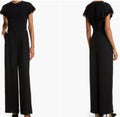 Ted Baker OLIVEE Cape Jumpsuit
Ladder Tape Detail Ted Baker Sz 2 which is a US Sz 6 in Black $375