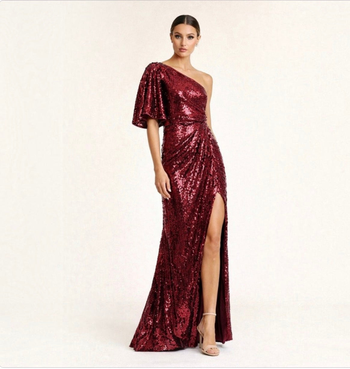 Mac Duggal 93540 Burgundy
Sequin One Shoulder Gown High Slit Size 8