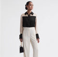 REISS 100% Silk Lorey
Black / Champagne
Colorblock Button Up Blouse size 6 $385
